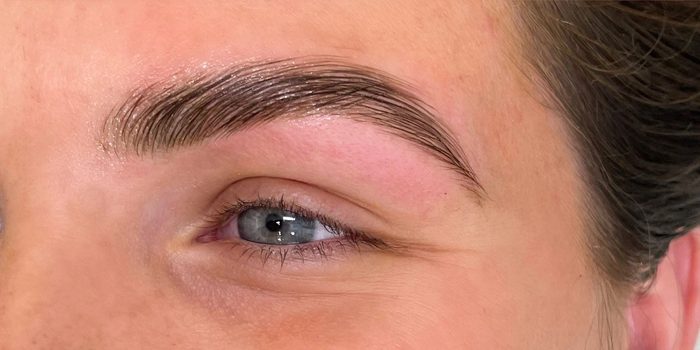 After: a fuller, brushed-up, tinted brow.