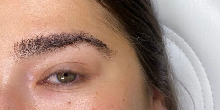 Before: natural, untamed brows.